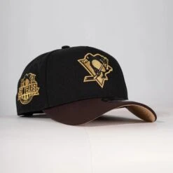 PITTSBURGH PENGUINS CAP BLACK 50TH PATCH GOLD UV / NEW ERA A-FRAME